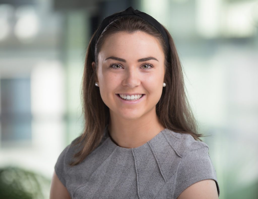 Headshot photographed against a natural background in chartered accountant house pearse street Dublin