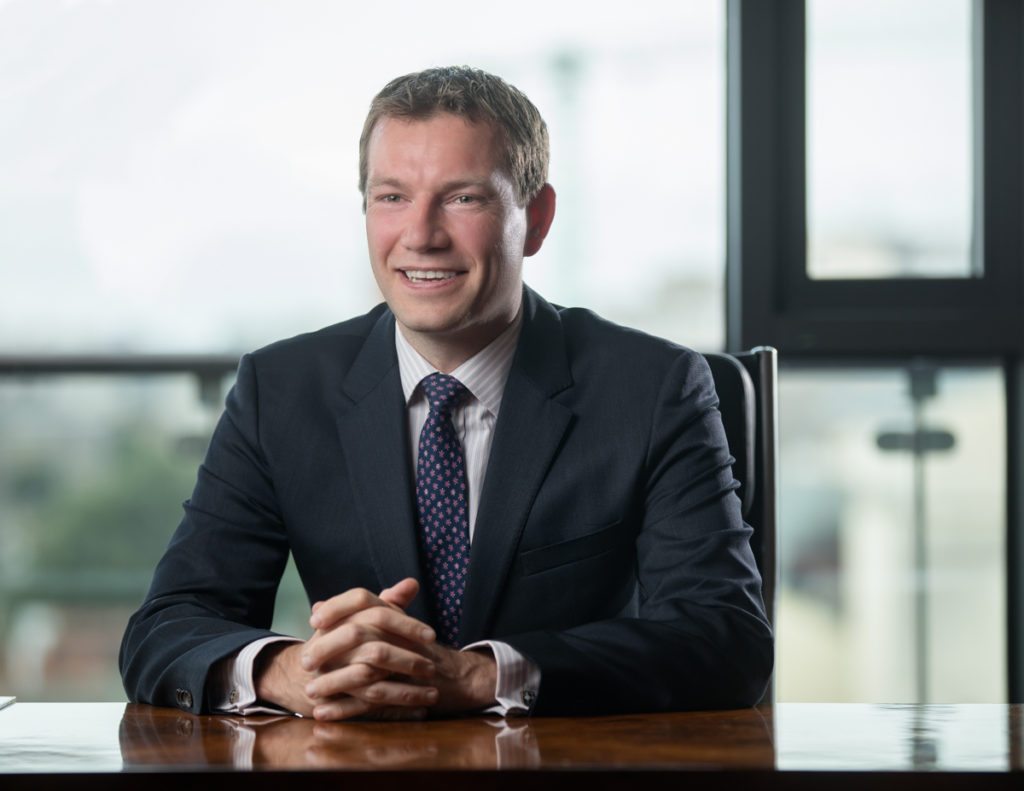 Experiential headshot profile photo photographed against a natural background in Chartered Accountant House Pearse Street Dublin