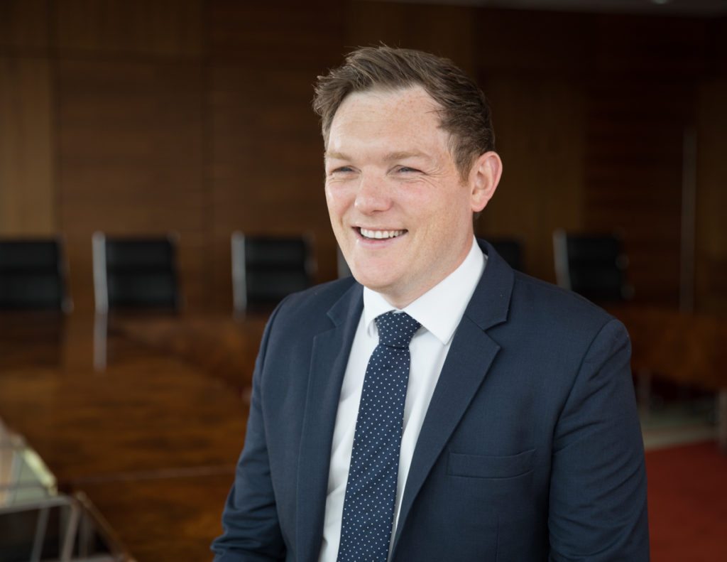 Experiential headshot profile photo photographed against a natural background in Chartered Accountant House Pearse Street Dublin