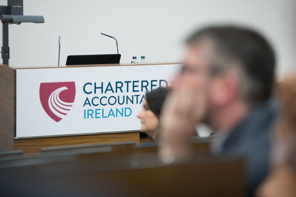 Harrison Photography & Media Ltd covering CGAI Speaking Up conference in Chartered Accountants Ireland on Pearse Street. Conference detail of signage on the podium.