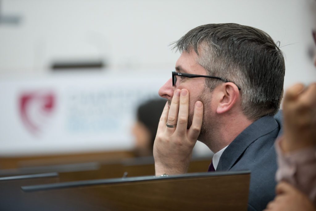 Harrison Photography & Media Ltd covering CGAI Speaking Up conference in Chartered Accountants Ireland on Pearse Street. Conference detail of audience member looking on.